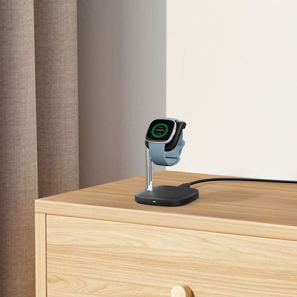 Fitbit smartwatch charging stand in a living room for convenient home charging SwanScout 505FB