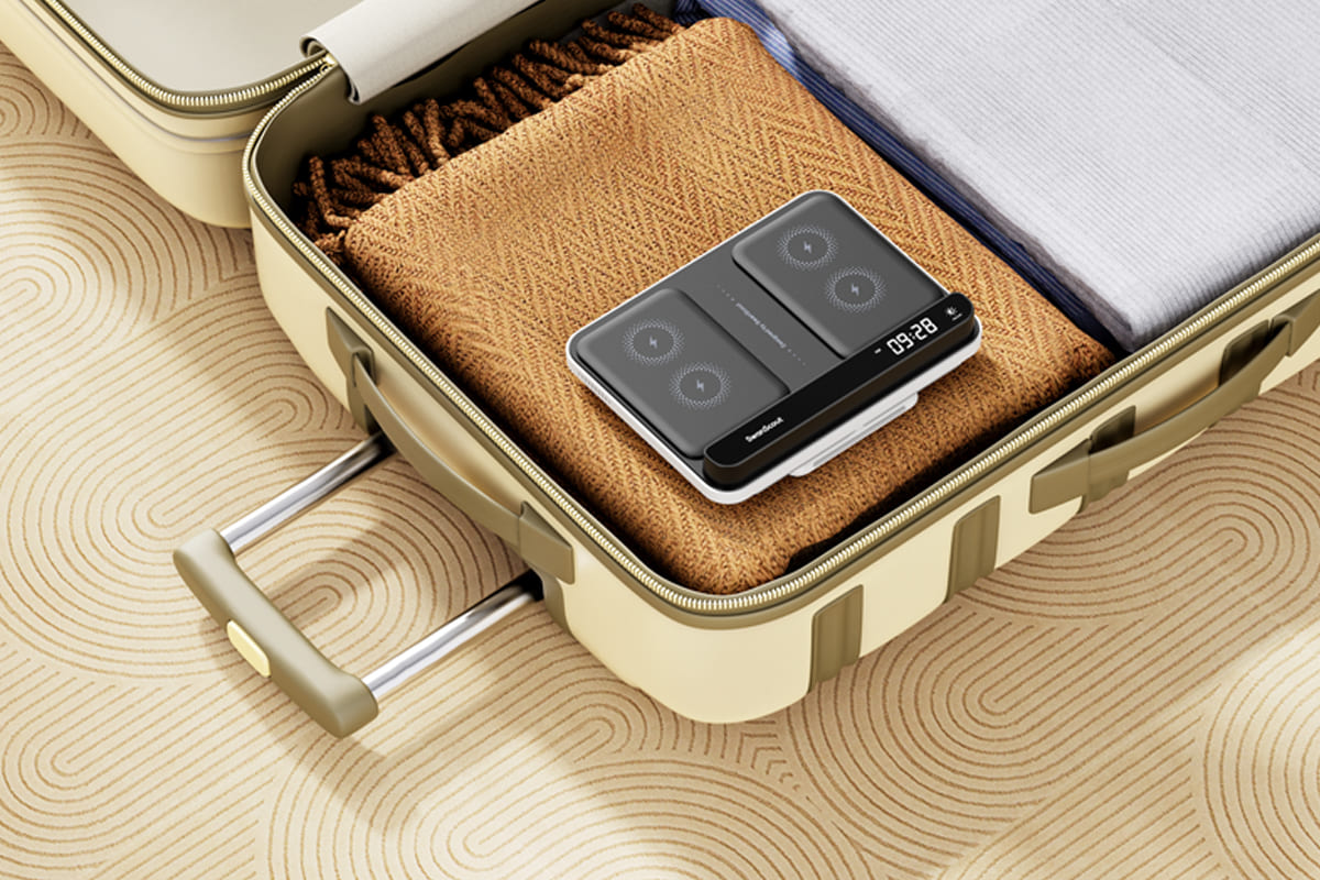 Foldable compact charging station stored in luggage for travel with the SwanScout 710G2