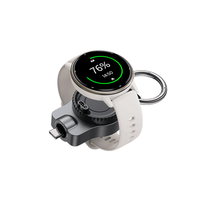 Garmin watch charging with compact USB-C keychain charger shown in left front 45 degree angle using SwanScout 510GM